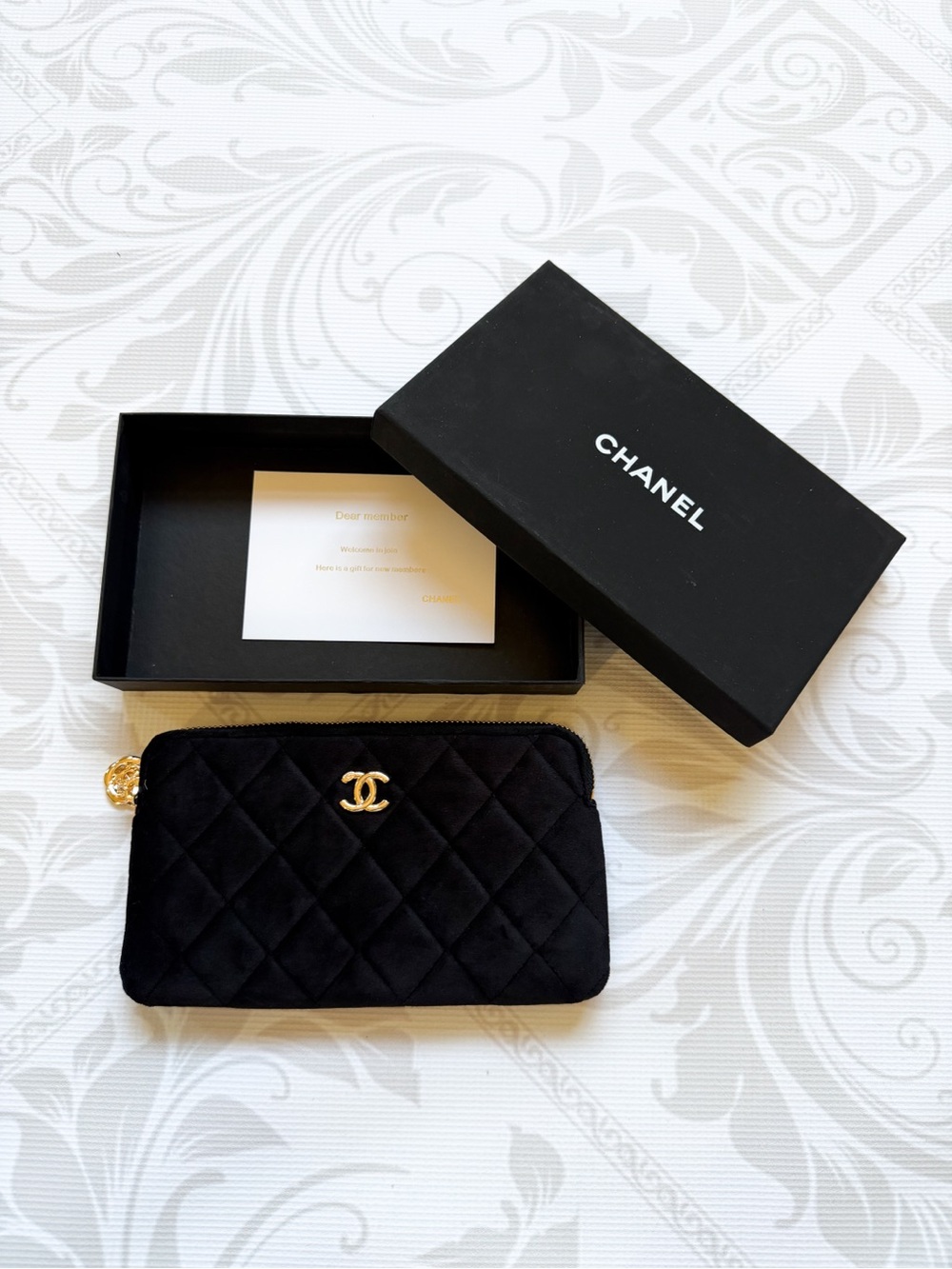CHANEL Black Quilted Cosmetic Pouch with Gold CC Emblem - Picture 2 of 11